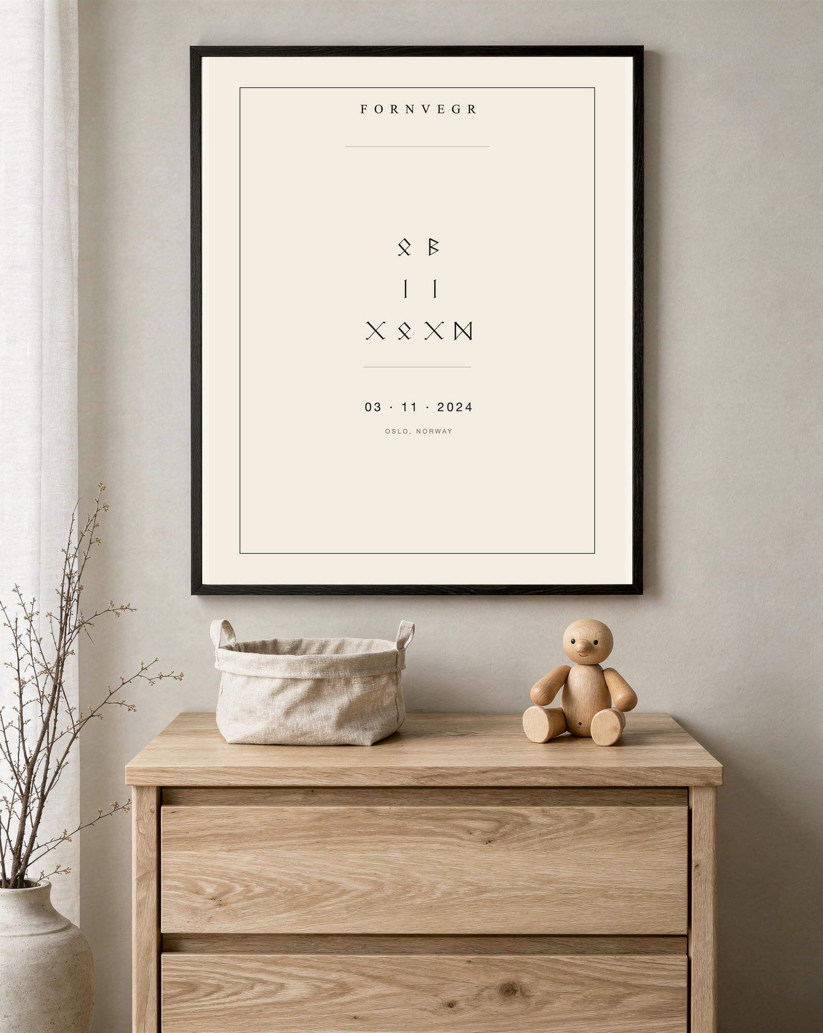 Personalized Runic Birth Marker in a black frame in a calm nursery