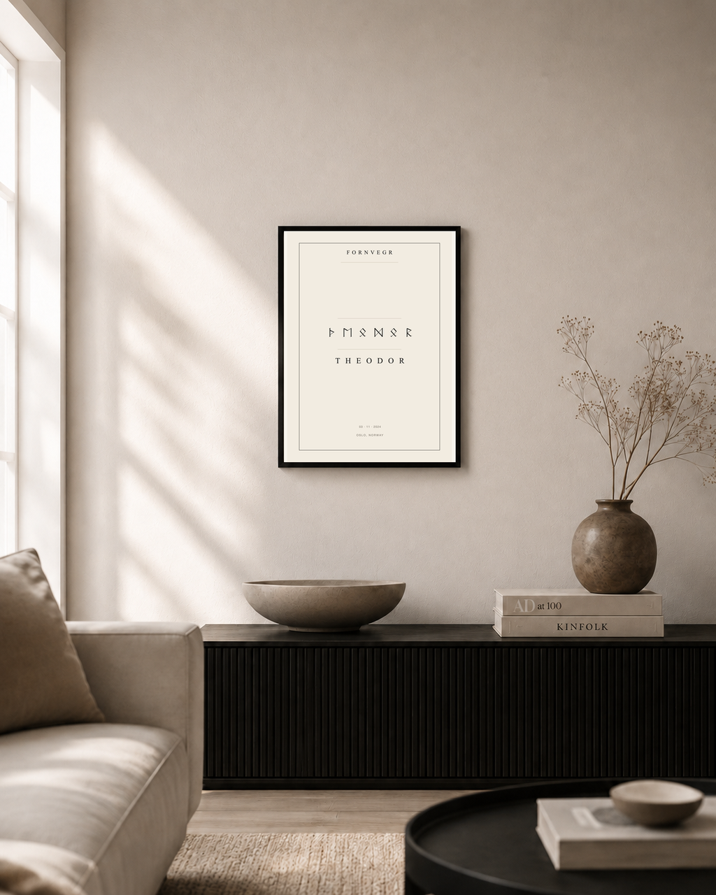 Personalized Elder Futhark Name Print in a black frame above a sideboard